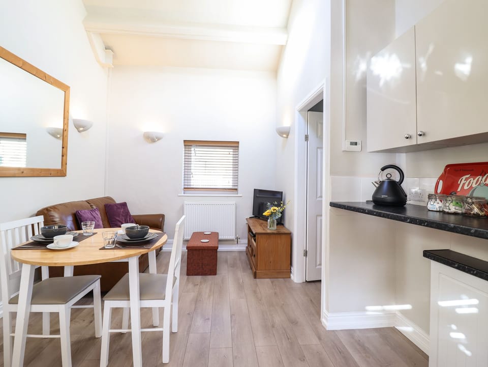 Fridge, electric kettle, toaster, cookware/dishes/utensils