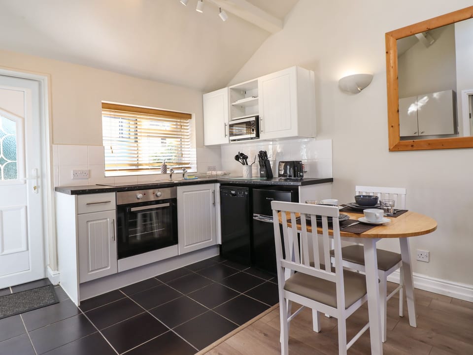 Fridge, electric kettle, toaster, cookware/dishes/utensils