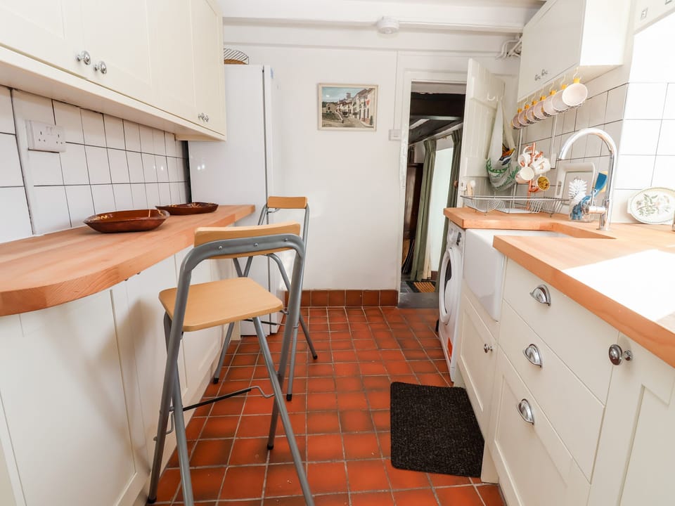 Fridge, electric kettle, toaster, cookware/dishes/utensils
