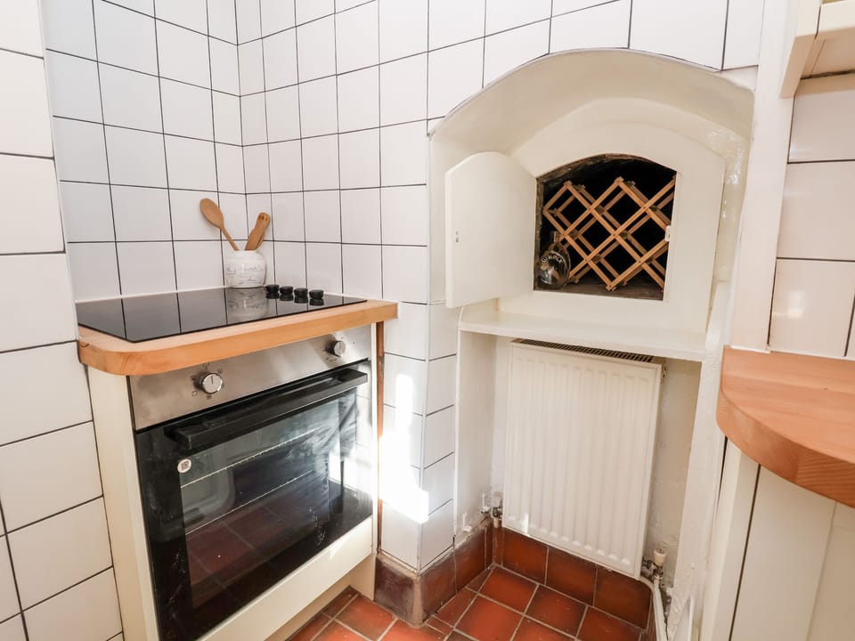 Fridge, electric kettle, toaster, cookware/dishes/utensils