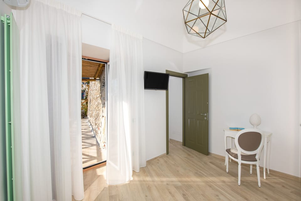 Apartment, 2 Bedrooms, Patio, Sea View | 2 bedrooms, desk, free WiFi, bed sheets