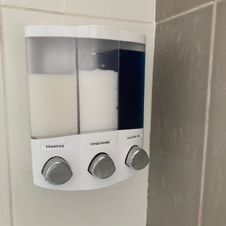 City Apartment | Bathroom | Combined shower/tub, deep soaking tub, hair dryer, towels