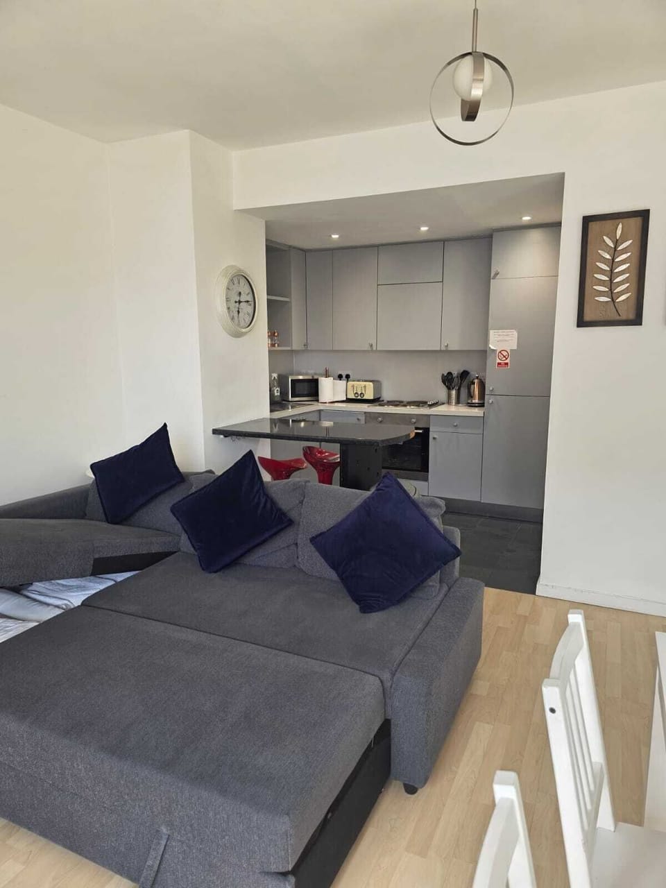 City Apartment | Living area | 45-inch flat-screen TV with digital channels