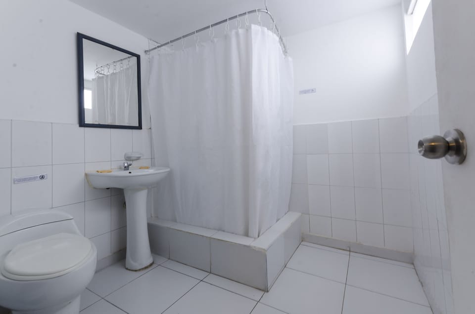 Shower, designer toiletries, hair dryer (on request), towels