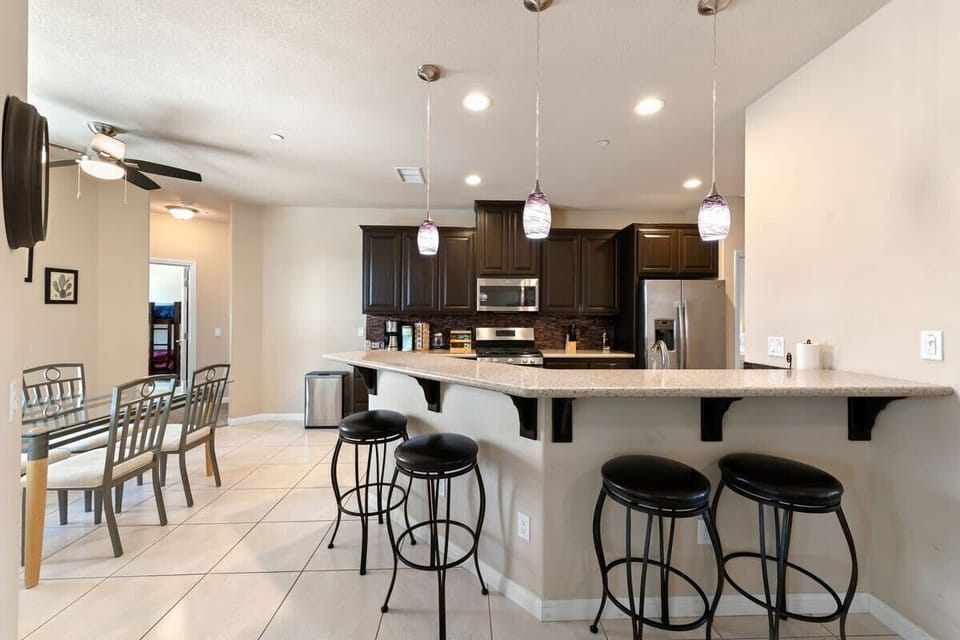 Kitchen with breakfast bar and casual dining area