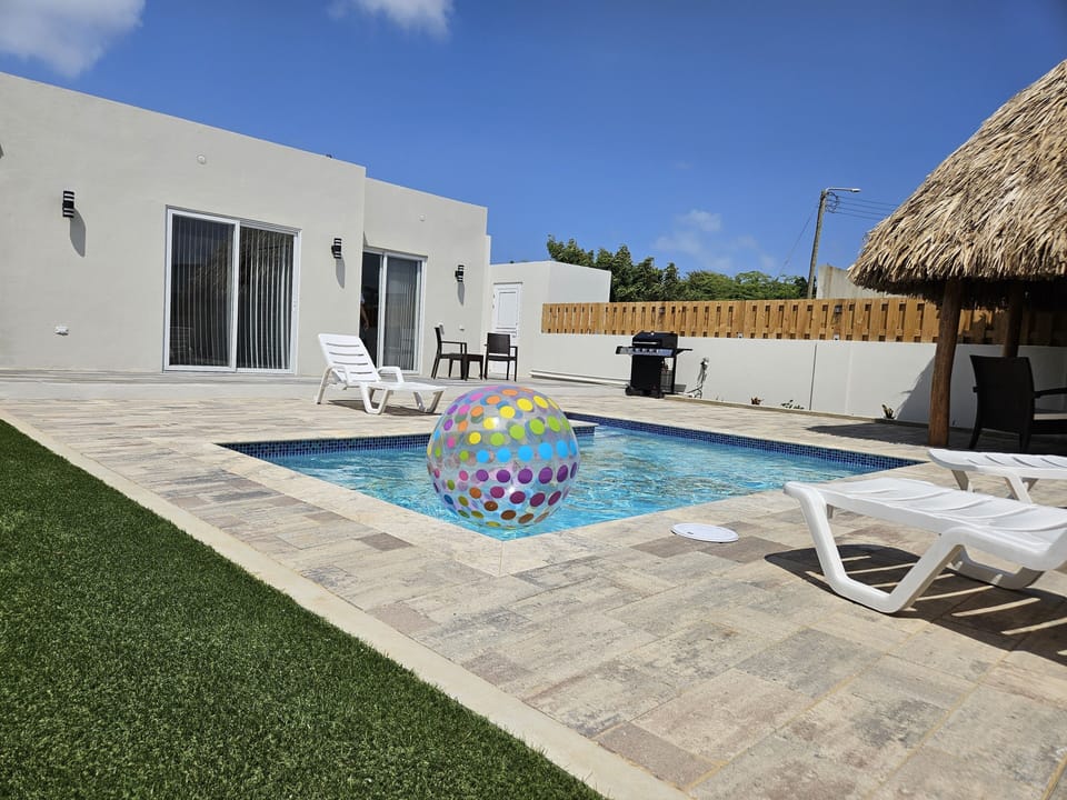 Pool with lounge chairs