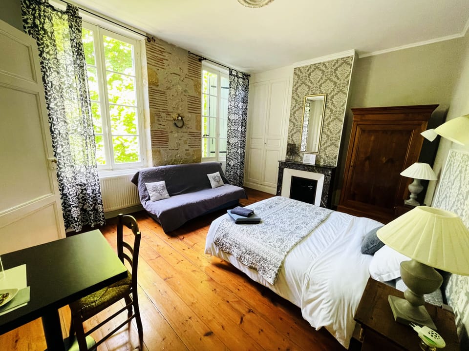 Chambre Familiale Jacinthe | Individually decorated, desk, blackout drapes, iron/ironing board
