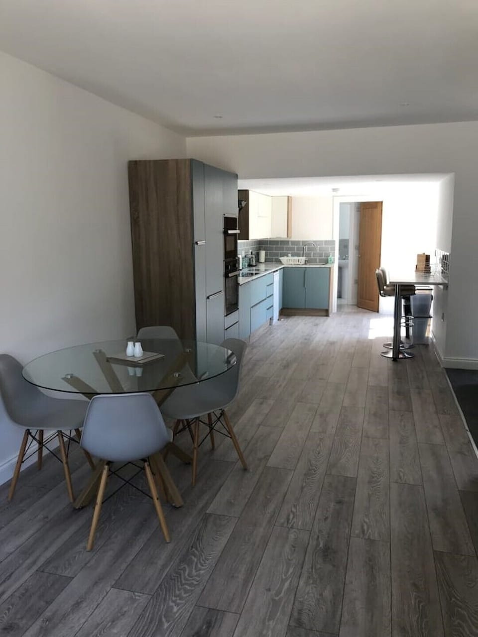 Dinning room into the kitchen and through to the utility and bathroom.