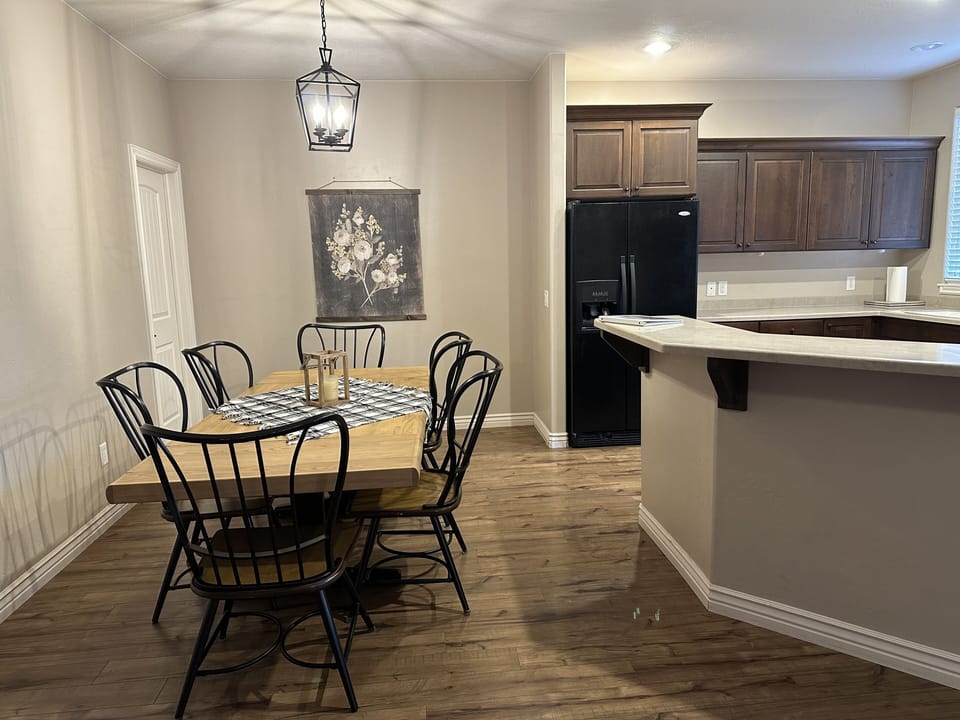 Kitchen area with large kitchen table.