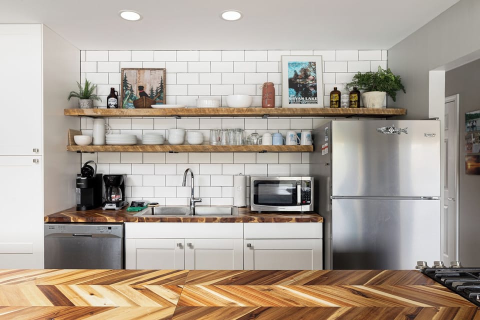 Cook with ease in the bright, fully stocked kitchen designed for everyday comfort.