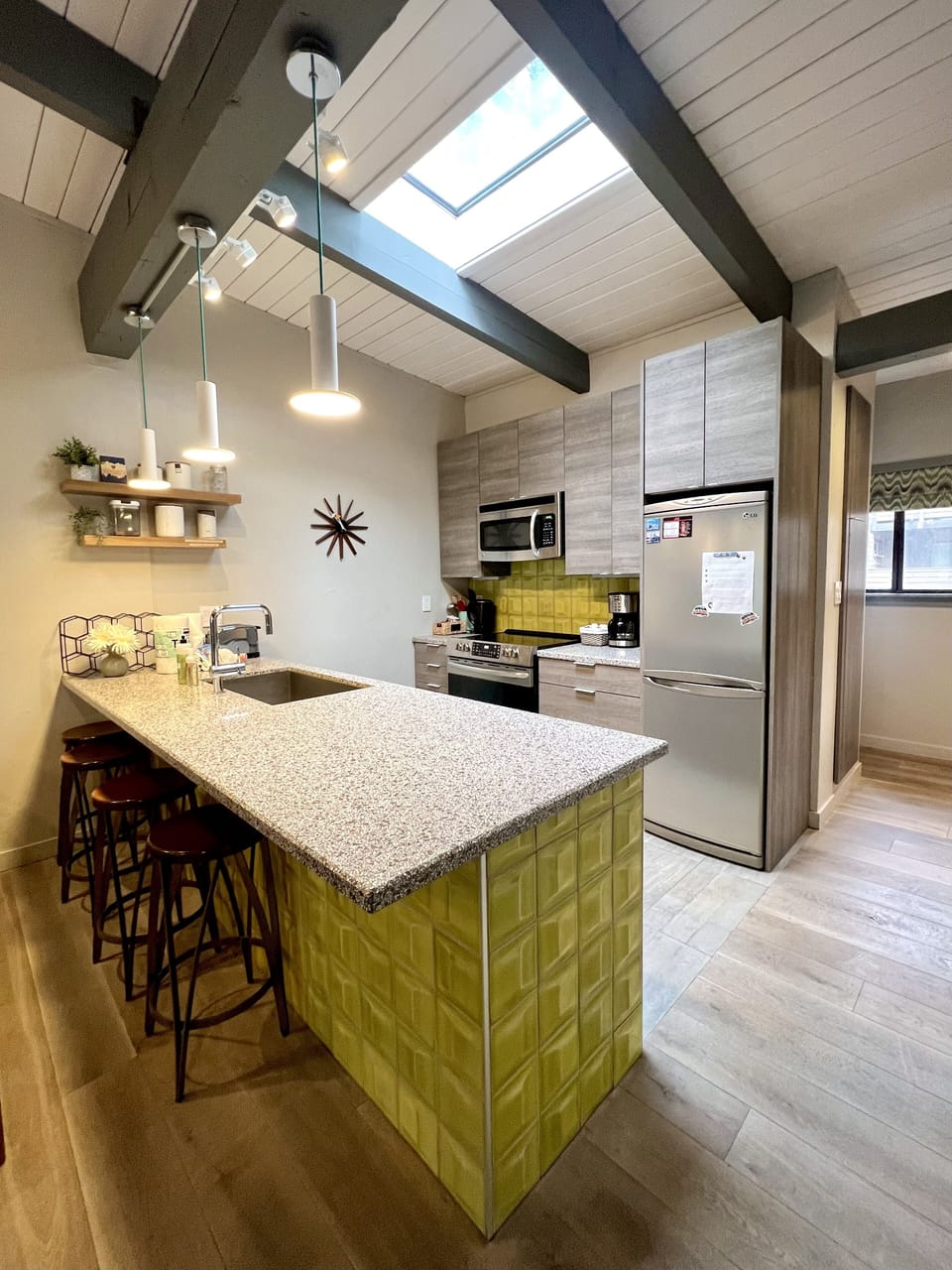 Remodeled kitchen with bar seating.