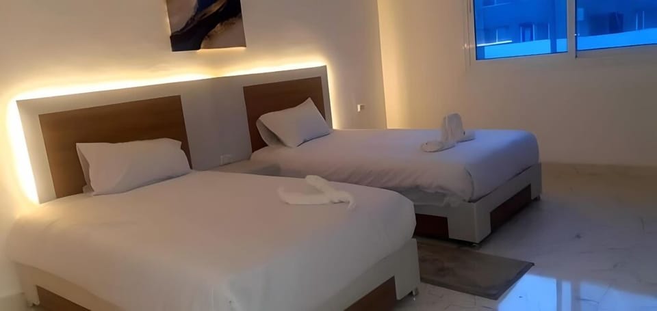 Family Suite, 2 Bedrooms, Non Smoking, Pool View | Minibar, in-room safe, desk, iron/ironing board