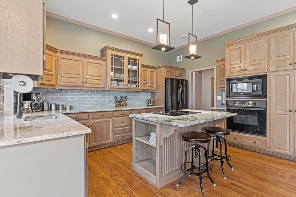 Gourmet Kitchen: Cook with style in this stunning space with modern appliances and natural light!