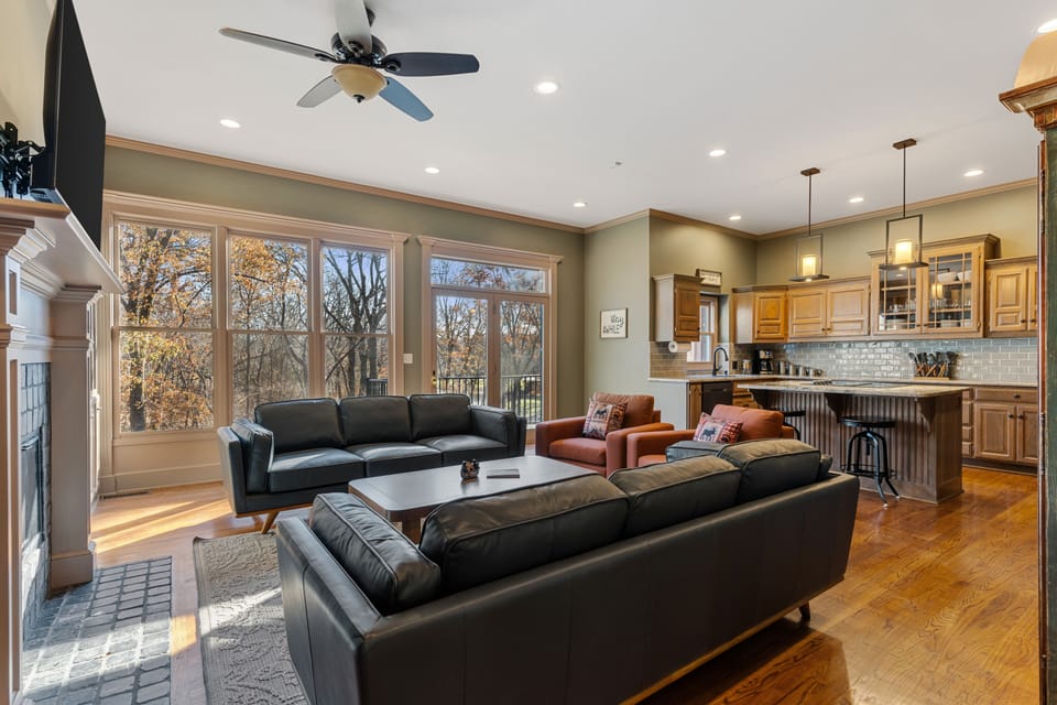 Main living room: This spacious open concept living room provides seating for all guest and includes access to balcony that connects to the Master Suite!