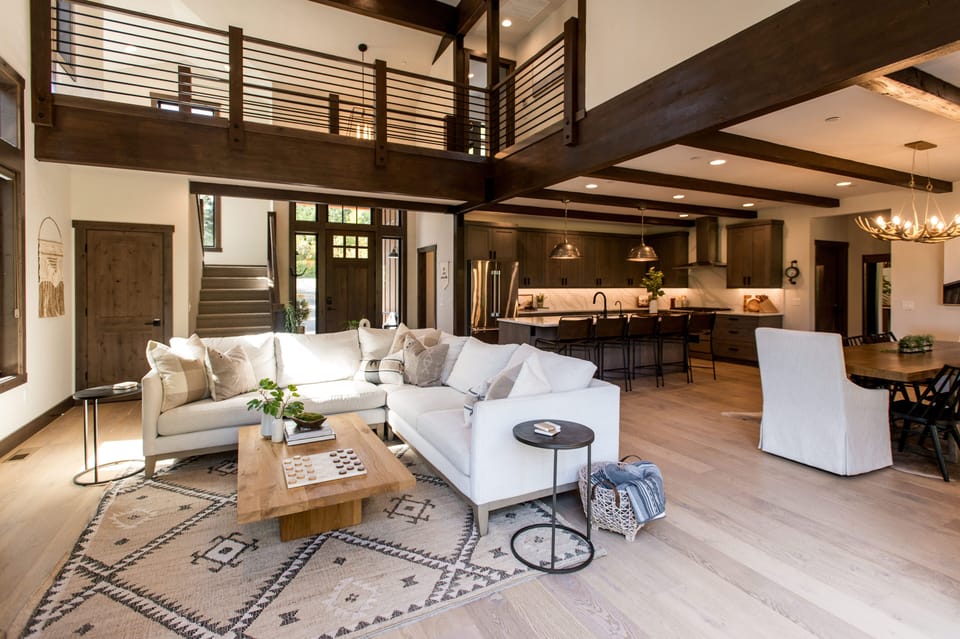 Open concept living room, dining and kitchen is perfect for your group