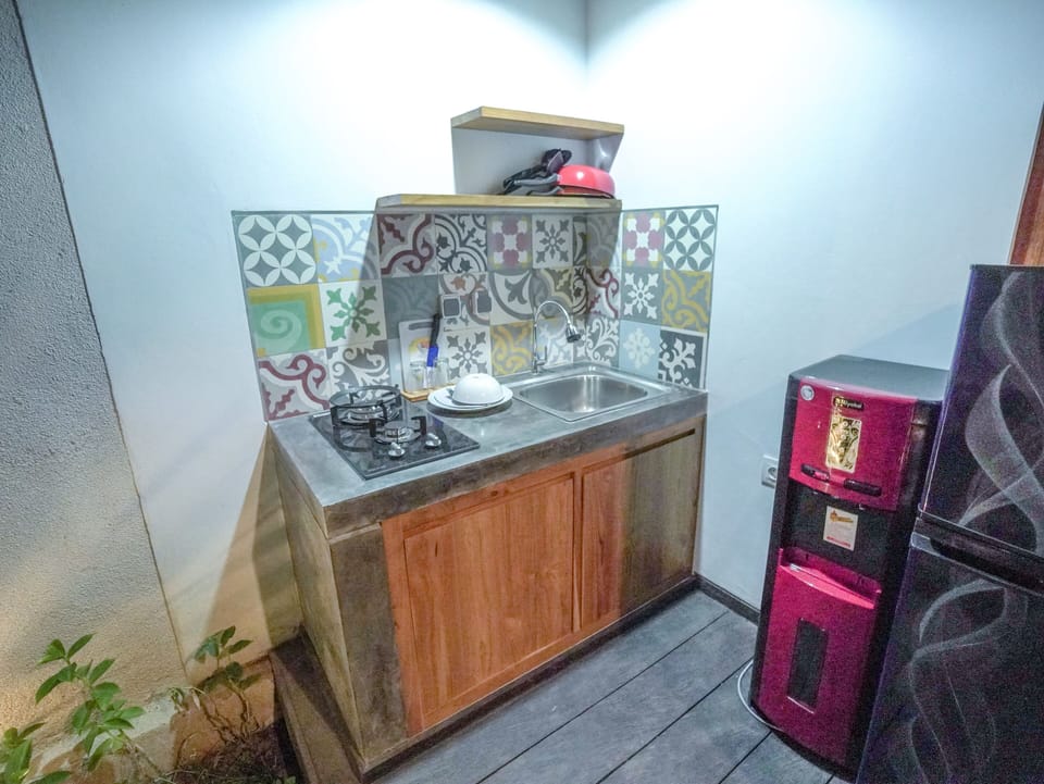 Deluxe Villa, 1 Bedroom, Private Pool, Pool View | Private kitchen | Full-size fridge, stovetop, cookware/dishes/utensils, kitchen islands