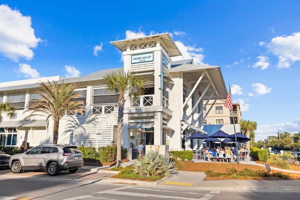 Grab a bite with a breeze at this open air favorite right across from the beach.