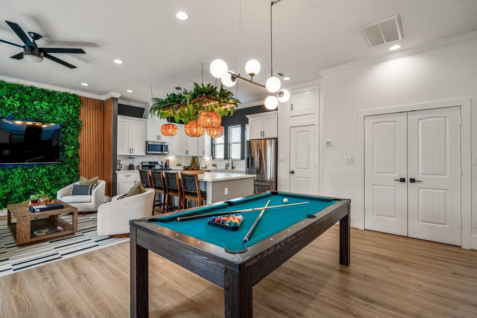 Our dining table easily converts into a pool or ping-pong table for your group to enjoy!