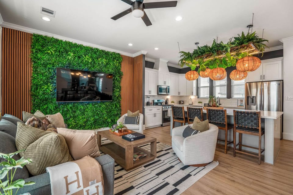 Enjoy our 75" Smart TV which emerges from our alluring jungle foliage wall. Sit or sleep on our large sofa which folds out into a comfortable queen bed with memory foam mattress.