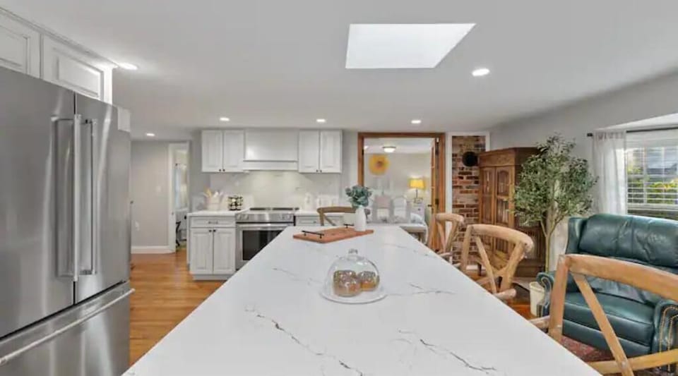 7’ island for prepping, dining or playing games.  KitchenAid Appliances
