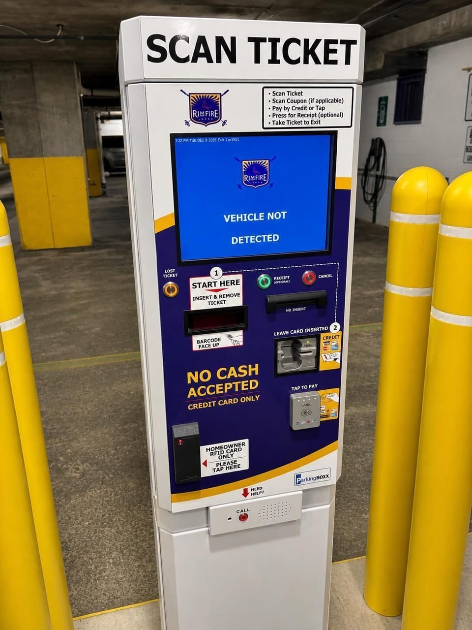 Parking garage ticket kiosk.