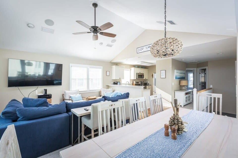 Top Level: Open-Concept Living and Dining Area with Comfortable Seating
