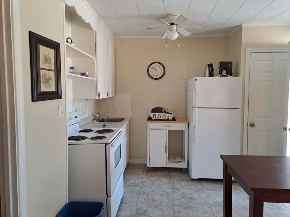Family Room | Private kitchen | Coffee/tea maker, full-size fridge, microwave, electric kettle