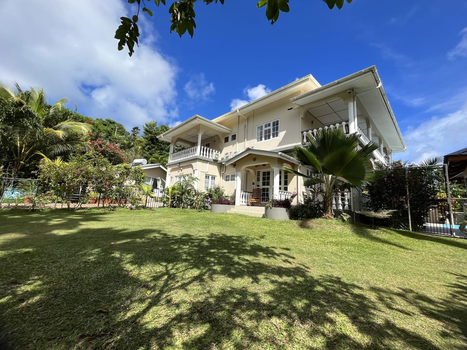 Level, secure lawned garden. Garden gated access to pool area