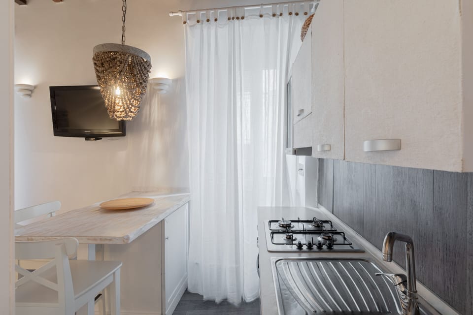 Luxury Apartment | Private kitchen | Full-size fridge, stovetop, espresso maker, coffee/tea maker