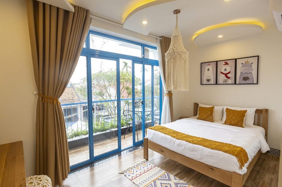 Deluxe Double Room, 1 Queen Bed, Pool View | In-room safe, individually decorated, desk, iron/ironing board