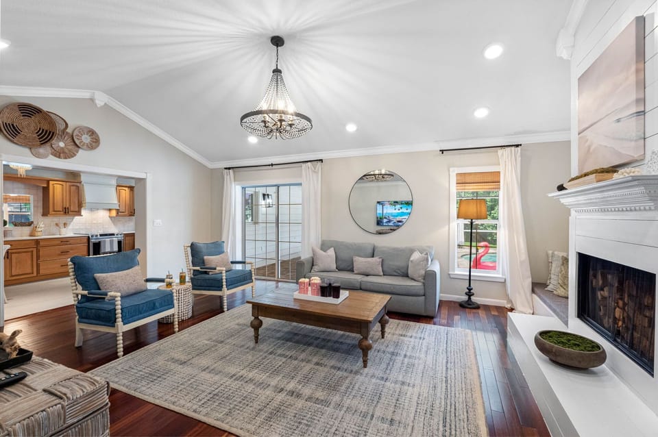 Comfortable seating and a warm color palette make this living room the perfect spot for relaxing with family or friends.