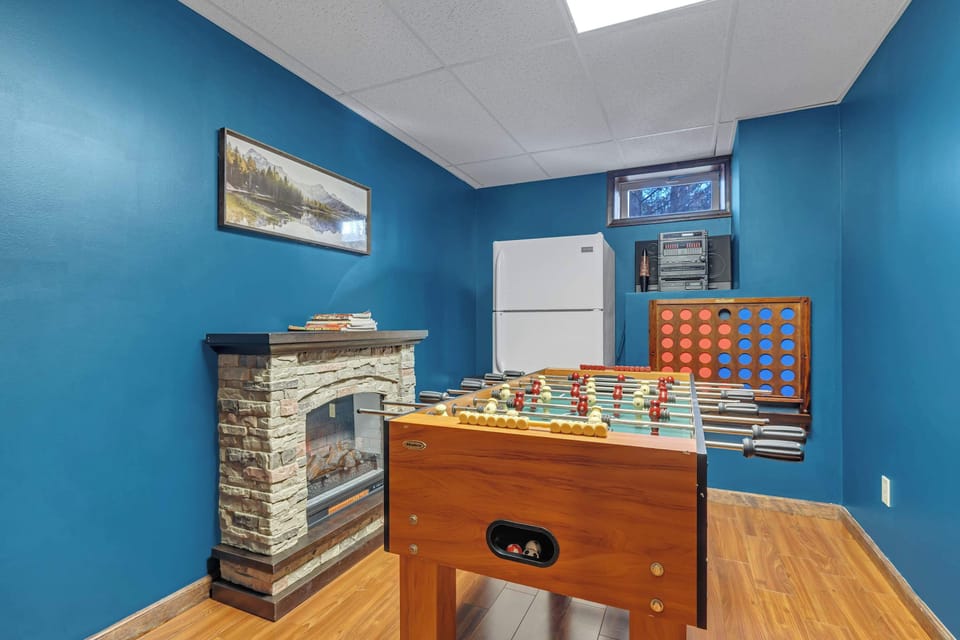 Call your shot on the foosball table — Connect Four and a mini fridge keep the rematches coming.