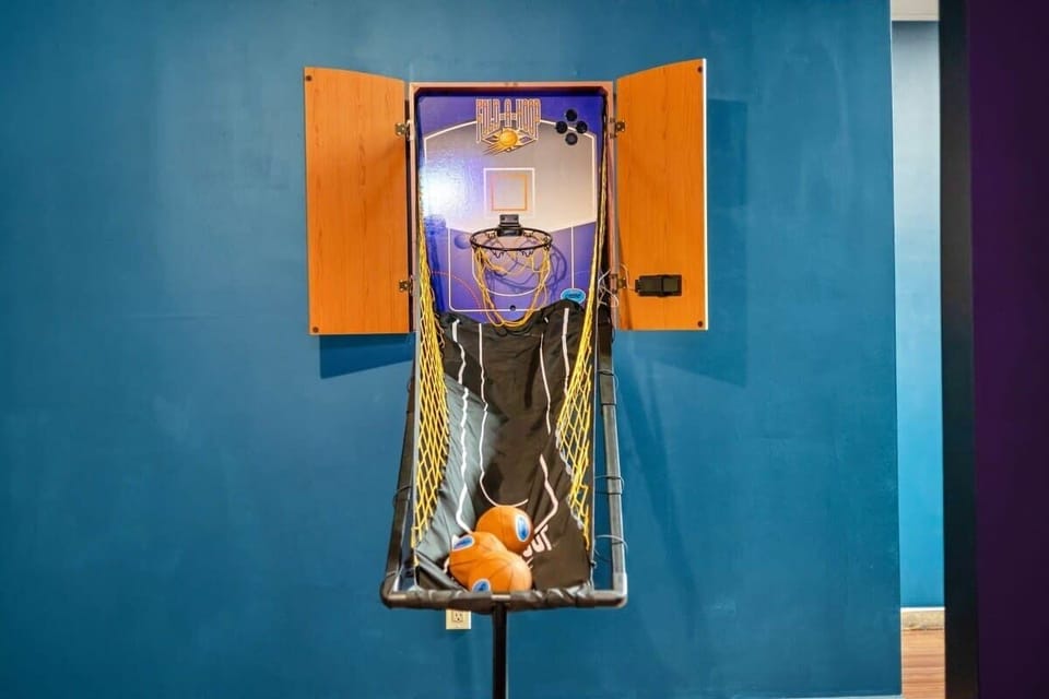 
Sink a few in the arcade hoop game while you wait your turn — quarters not required.