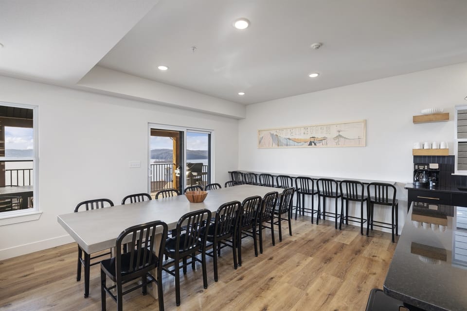 Rocky Resort: Main Level - Dining Room seating 12 at table and 9 on bar stools
