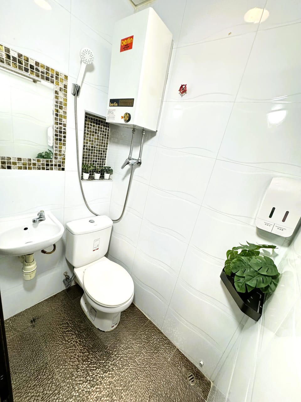 Shower, free toiletries, hair dryer, slippers