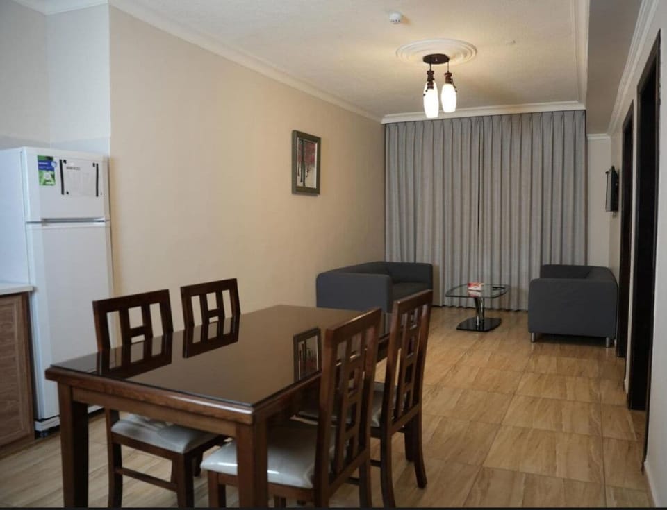 Apartment | Living area | 32-inch LCD TV with satellite channels