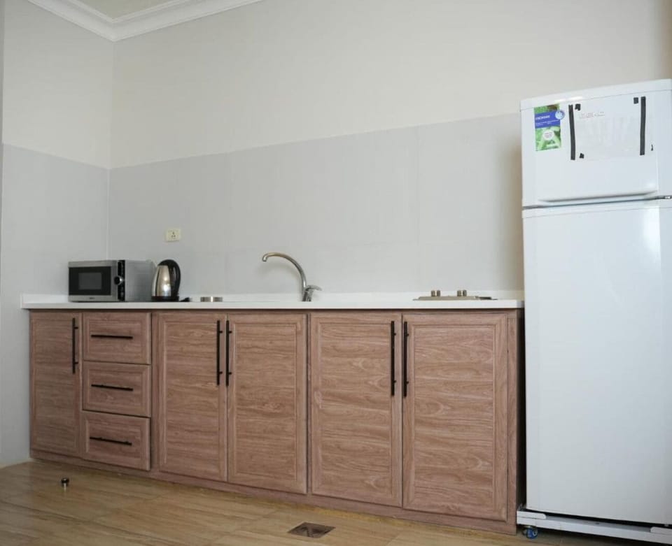 Apartment | Private kitchen | Full-size fridge, microwave
