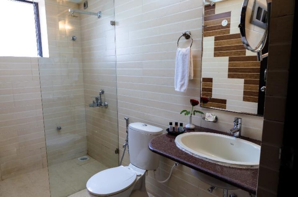Shower, free toiletries, towels, soap