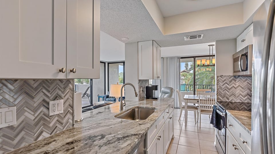 Condo, 2 Bedrooms | Private kitchen | Coffee/tea maker, fridge, oven, toaster
