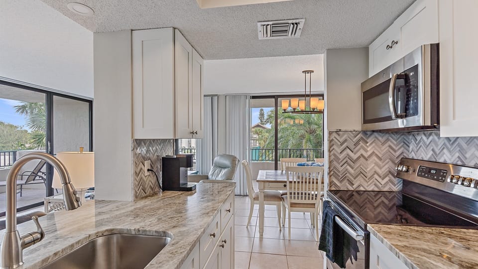 Condo, 2 Bedrooms | Private kitchen | Coffee/tea maker, fridge, oven, toaster