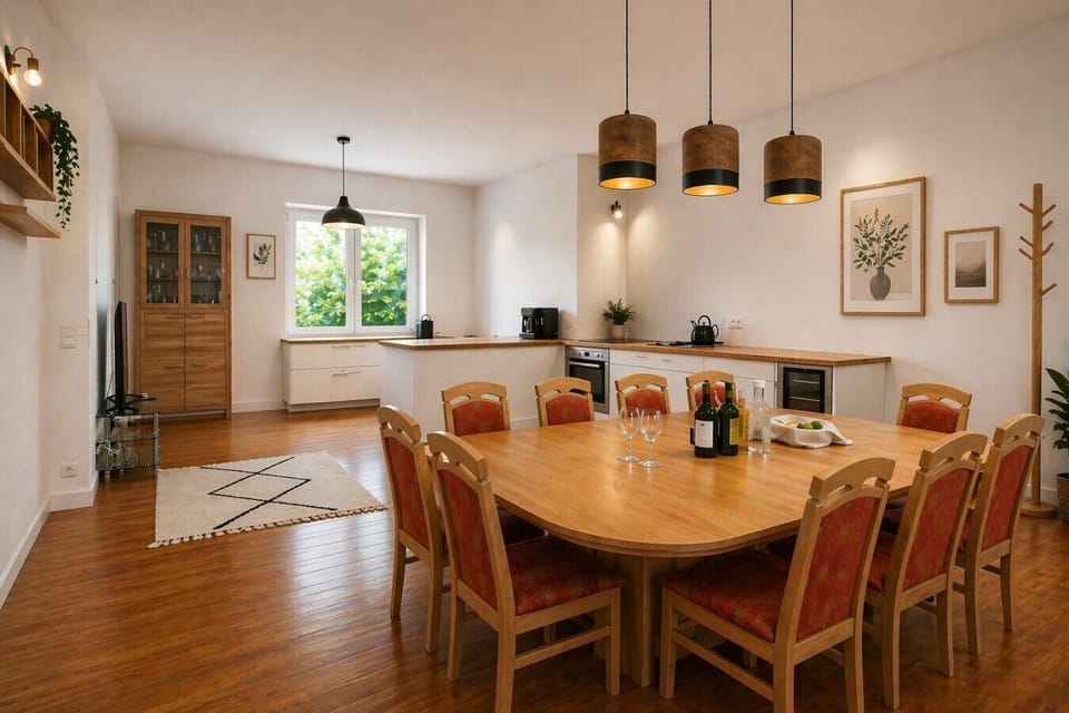 Gather around the table in a warm and inviting dining space.