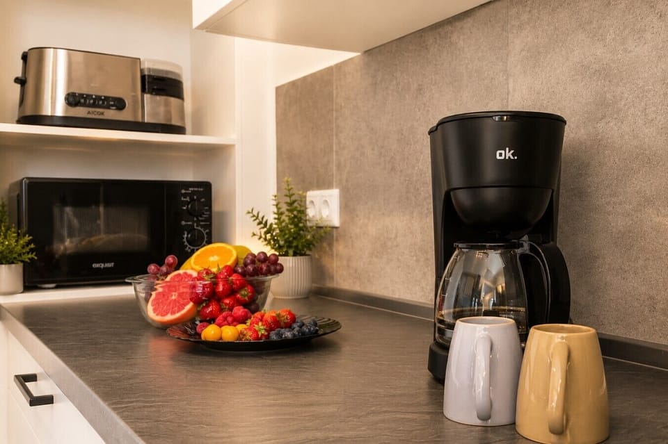 Enjoy the comforts of home with a well-appointed kitchenette featuring a coffee maker, microwave, and everything you need for quick breakfasts and snacks.