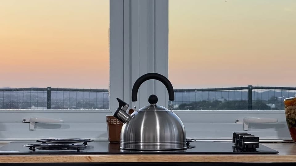Coffee with a sunset? Count us in!