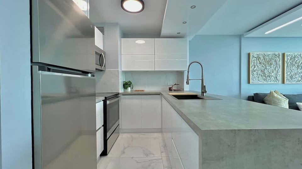 The kitchen offers plenty of counter space to make cooking a delight.