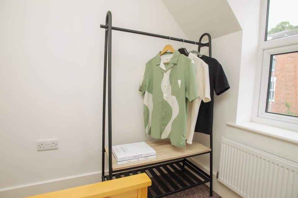 Rest easy in the first bedroom, featuring a comfortable double bed and stunning views that bring tranquility and beauty right to your window.
