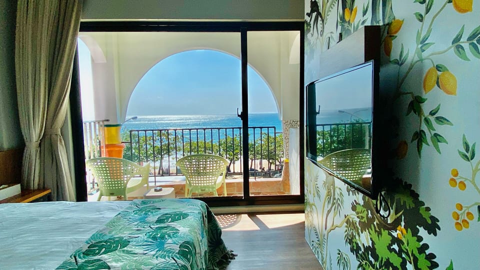 Deluxe Double Room with Ocean View | Individually decorated, individually furnished, free WiFi, bed sheets