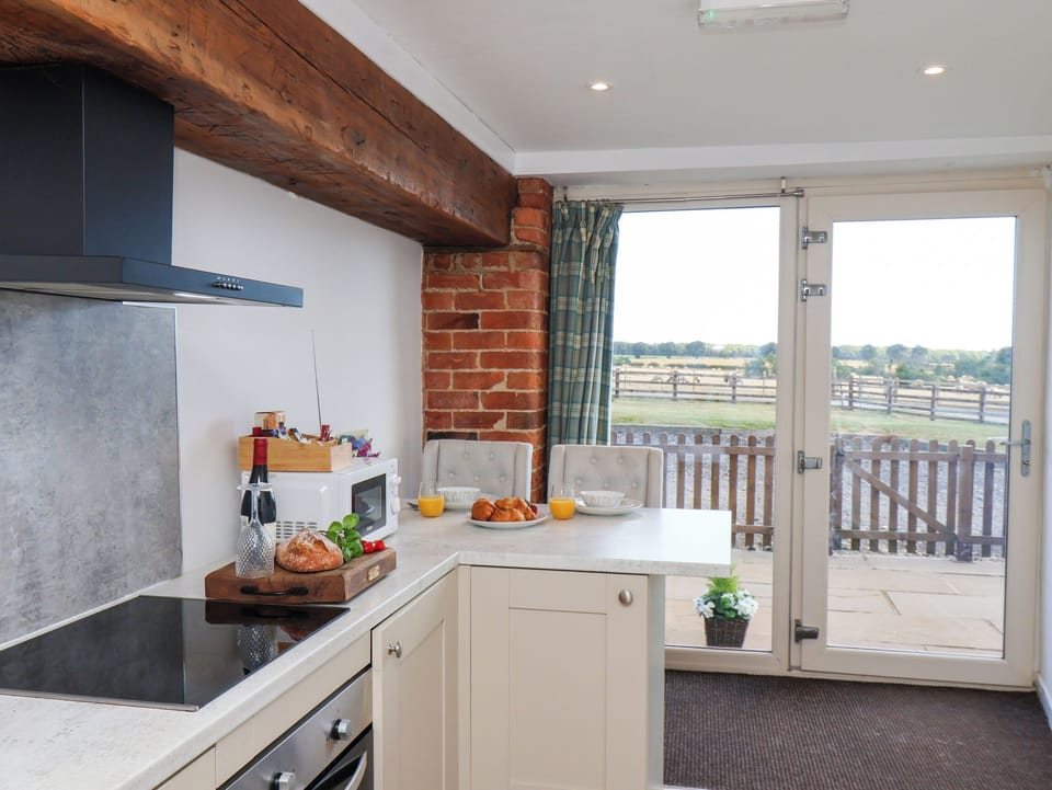 Cottage | Private kitchen | Fridge, dishwasher, electric kettle, toaster