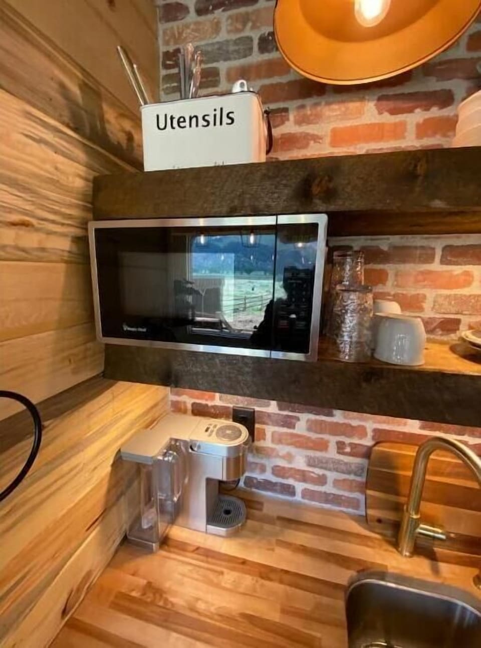 Microwave, mugs, utensils.