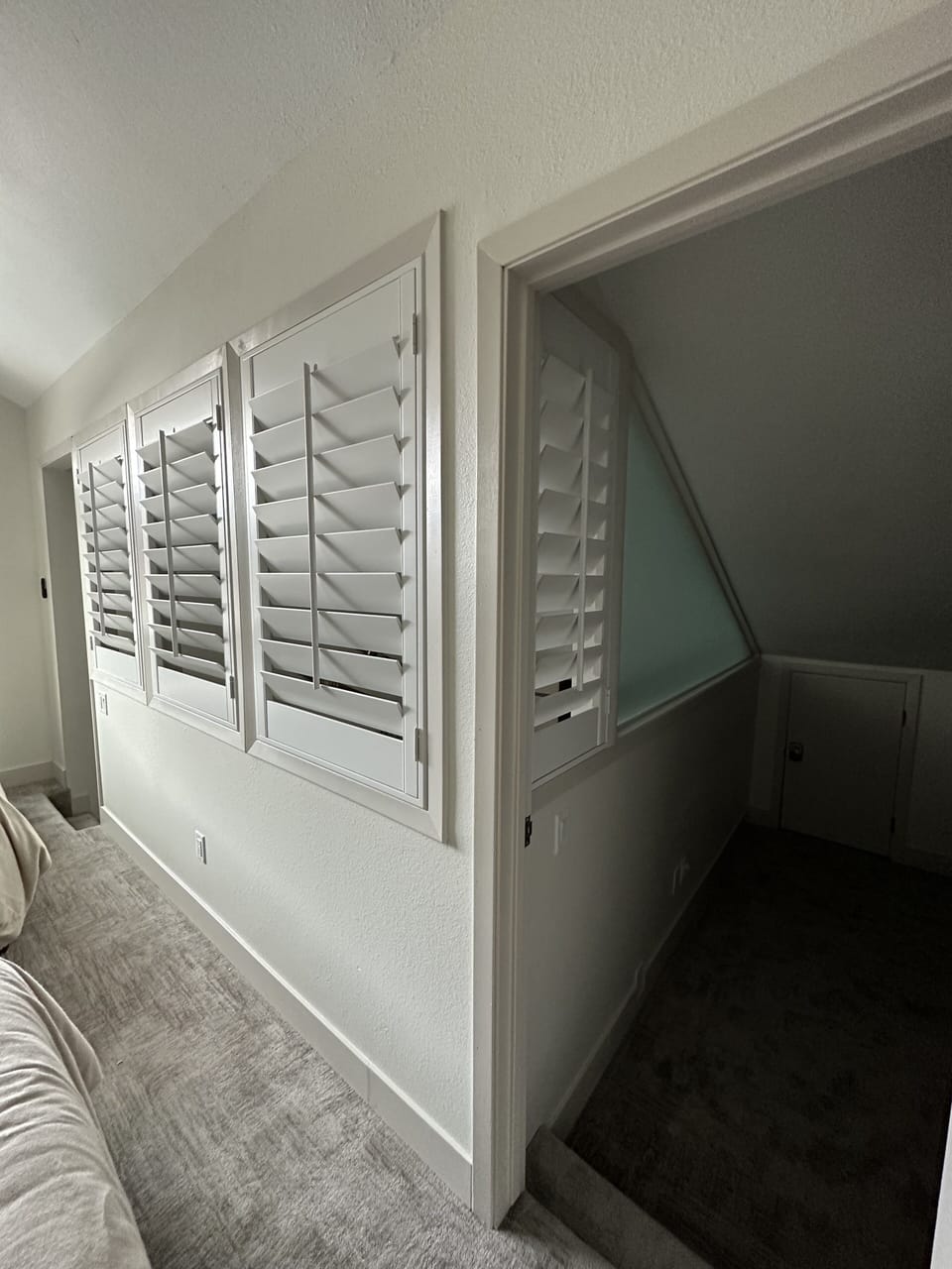 Shutters offer privacy for upstairs loft areas