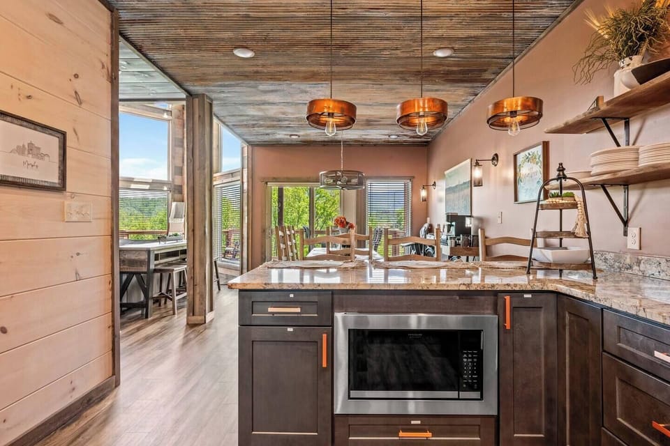 Fully-stocked kitchen with bar seating 